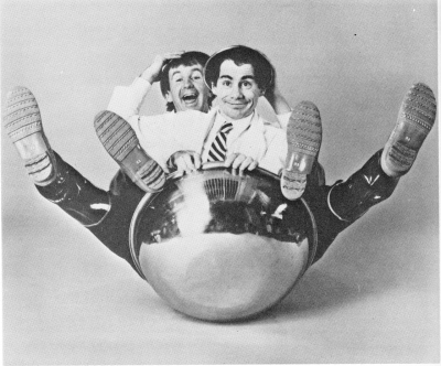 Berkey (behind) and Moschen "bowling" over Broadway (Dan Wagner photo) 
