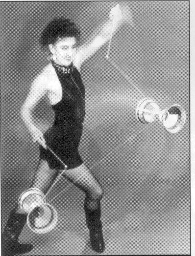 Leather and lights.  Noelle Franco on her own with two diabolos.