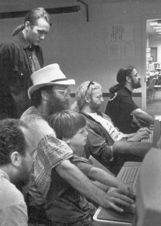 Festival jugglers check out the Juggling Information Service from a University of Vermont computer lab during the Burlington festival.  (standing) Todd Smith, (Seated l-r) Andrew Conway and his son, Dan, Chan Wilson, and JIS creator Barry Bakalor.