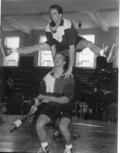  Jimmy Robertson leaps over Todd Blair as "Flight Patterns" performs at the Groundhog Day fest.