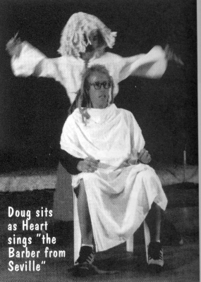 Doug sits as Heart sings "the Barber from Seville"