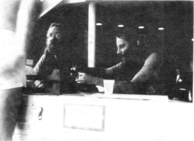 John Robinson (I) and Eric Roberts, co.chairpeople of the convention, worked straight through the entire week. But they did find some juggling time, during which Eric practiced four balls in one hand. He vowed to be juggling seven with two hands in time for next year's convention in Fargo.