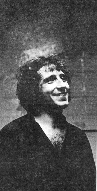 Santos unwinds backstage after his performance.