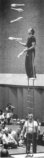 Top of the juggling world. Popovitch keeps eyes up on five clubs as father Alex keeps an eye on the foundation of the act.