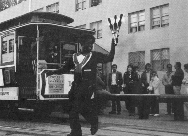 Ray flashes the grin for the cable car crowd.