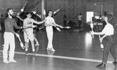 Lisa Collins feeds Ken Paller, Keith Hughes & Dale Peterson (Dollarhide photo)