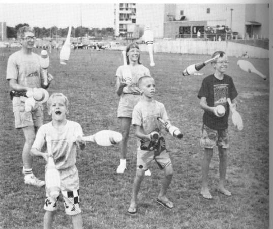 left) Don & Lana Reed, convention videographers; (middle) Local girls learning to juggle on Field Day; (right) Guest artist Ken Chen from Taiwan gives a diabolo workshop.