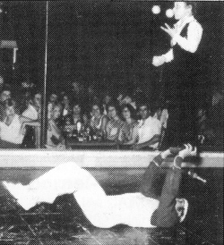 Romano has been supported by his father throughout his juggling career.  Here he is on stage in Greece at age 7.