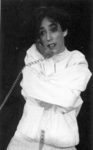 Felder tells a story of courtship in a straightjacket (Photo by Gene Dugan, Out North Theatre)