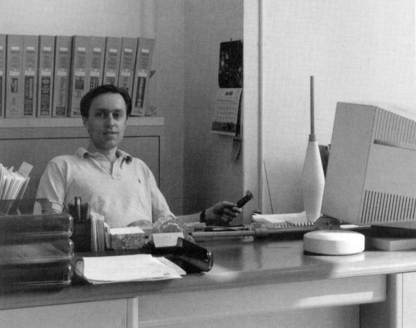 Brian Dube' at his desk.