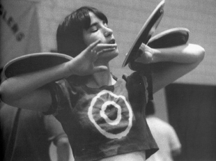 Sandy Amass practices the plate act she demonstrated at Club Renegade.